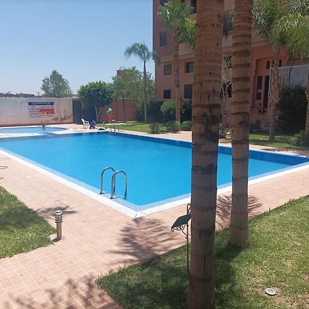 Appartement Haut Standing Vu Piscine Marrakesh Bagian luar foto