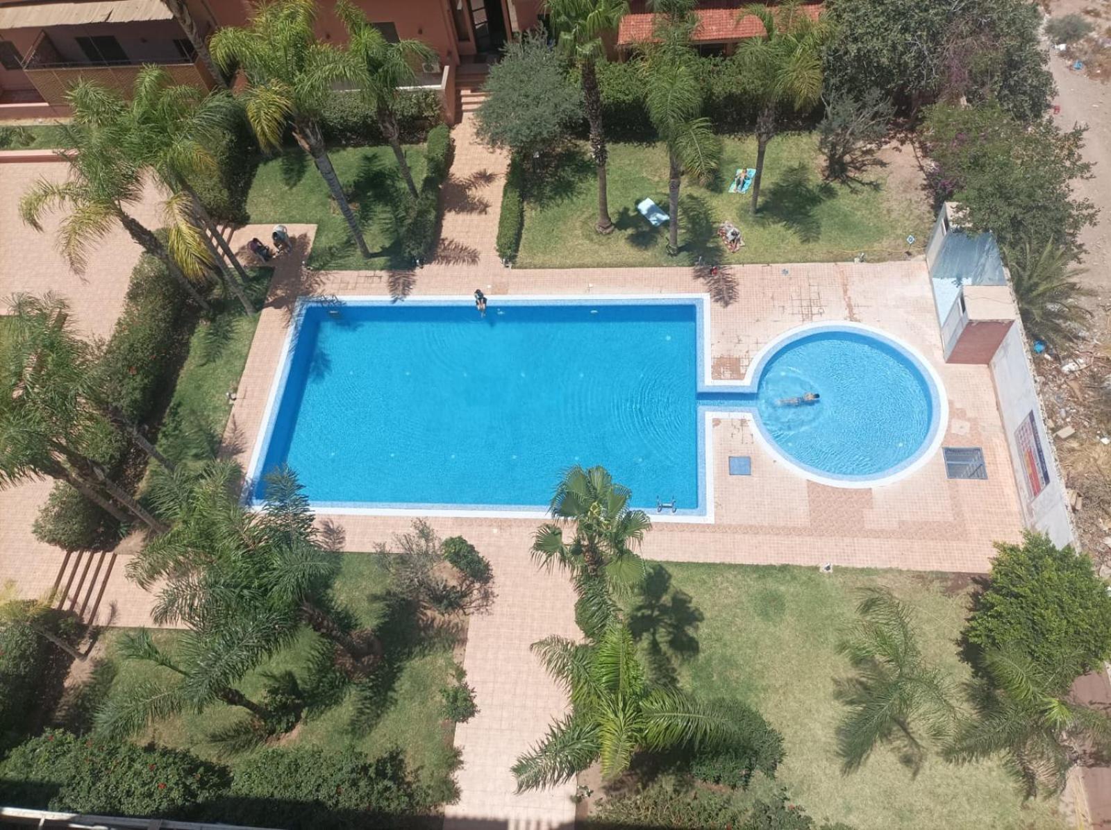 Appartement Haut Standing Vu Piscine Marrakesh Bagian luar foto