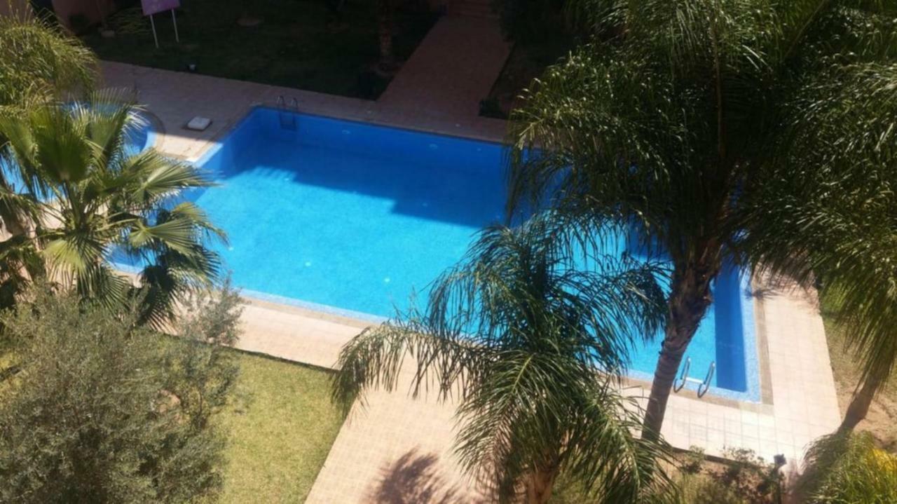 Appartement Haut Standing Vu Piscine Marrakesh Bagian luar foto