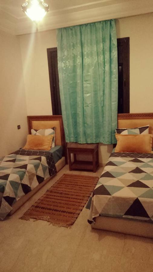 Appartement Haut Standing Vu Piscine Marrakesh Bagian luar foto